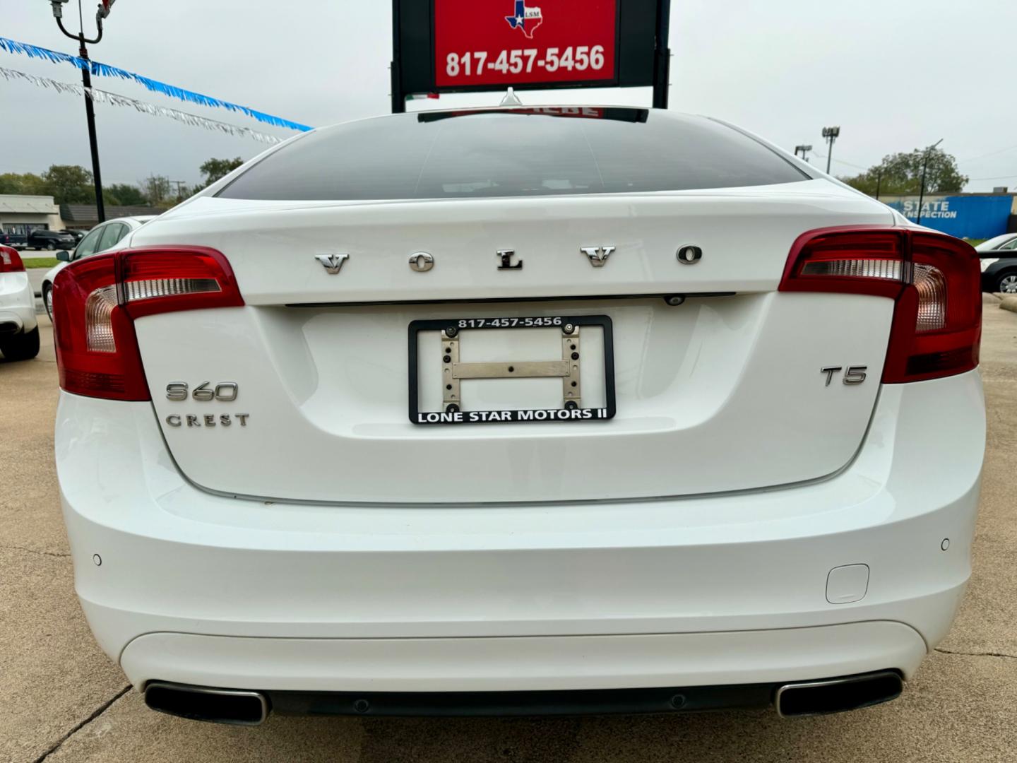 2015 WHITE VOLVO S60 PREMIER PLUS (YV140MFC3F1) , located at 5900 E. Lancaster Ave., Fort Worth, TX, 76112, (817) 457-5456, 0.000000, 0.000000 - This is a 2015 VOLVO S60 PREMIER PLUS 4 DOOR SEDAN that is in excellent condition. There are no dents or scratches. The interior is clean with no rips or tears or stains. All power windows, door locks and seats. Ice cold AC for those hot Texas summer days. It is equipped with a CD player, AM/FM radi - Photo#5